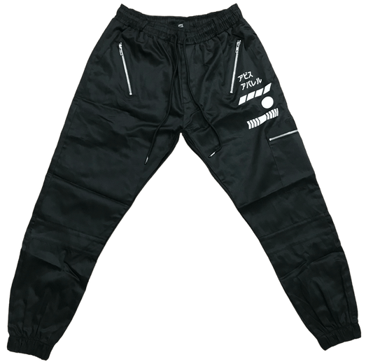 C2-K1 slim fit black joggers by Abiss Apparel with zipper pockets and graphic designs, perfect for modern streetwear style.