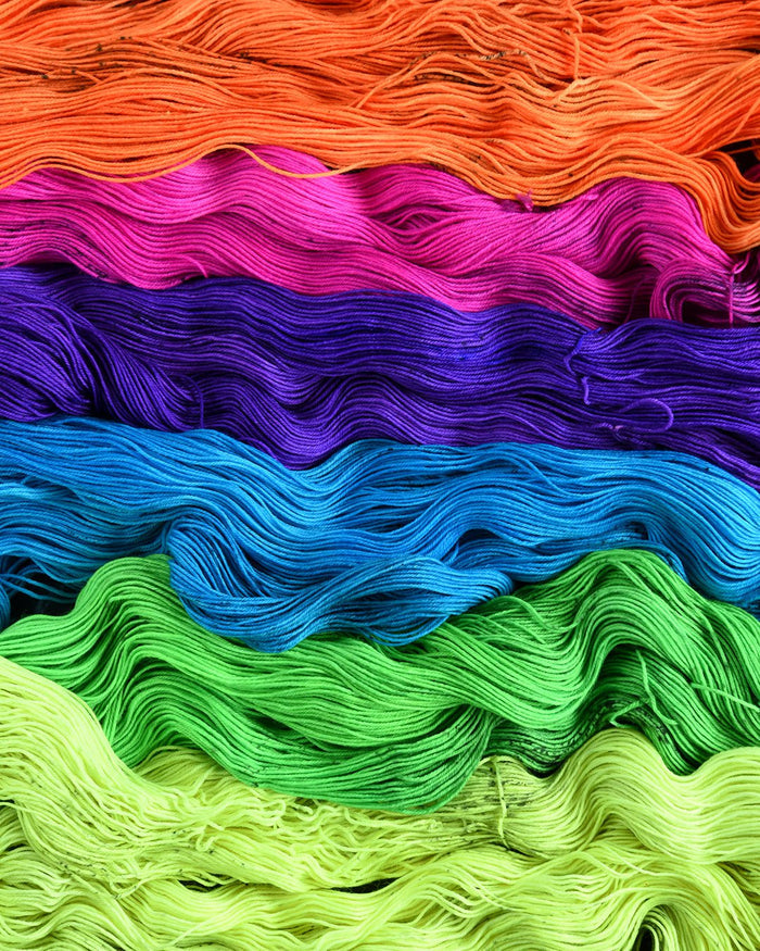 Destination Yarn fingering weight yarn Electric Orange